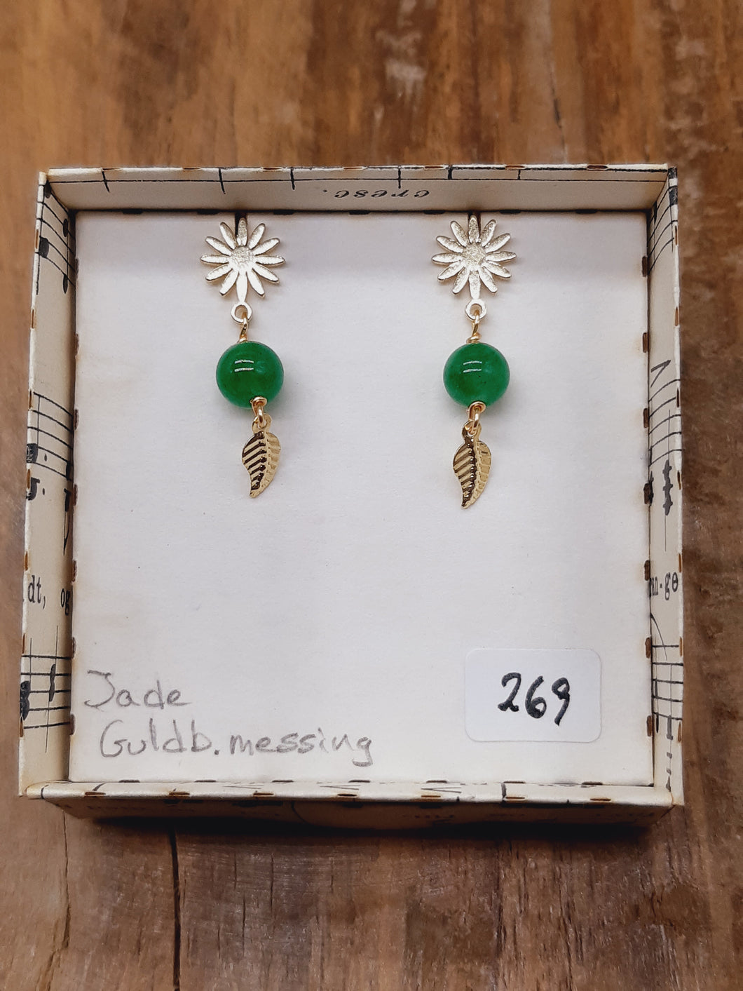 Græsgrøn jade med blad i blomst