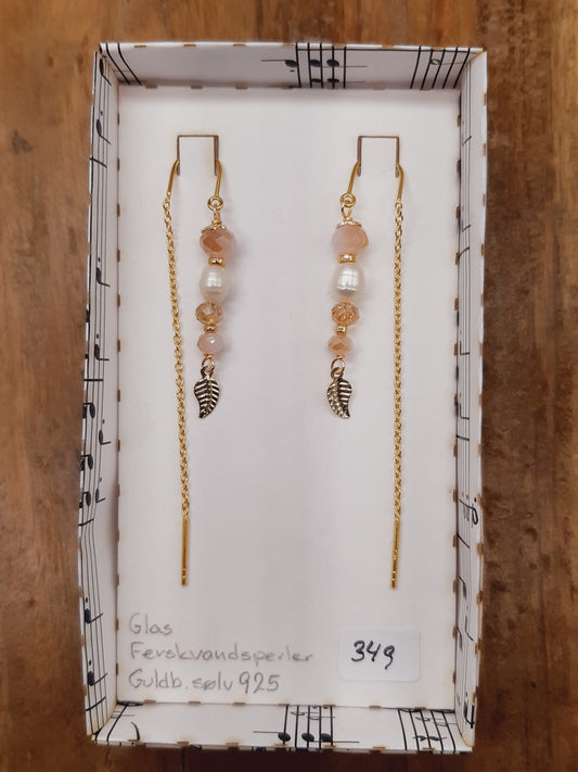 Gylden facetglas, ferskvandsperle og blad i tråd