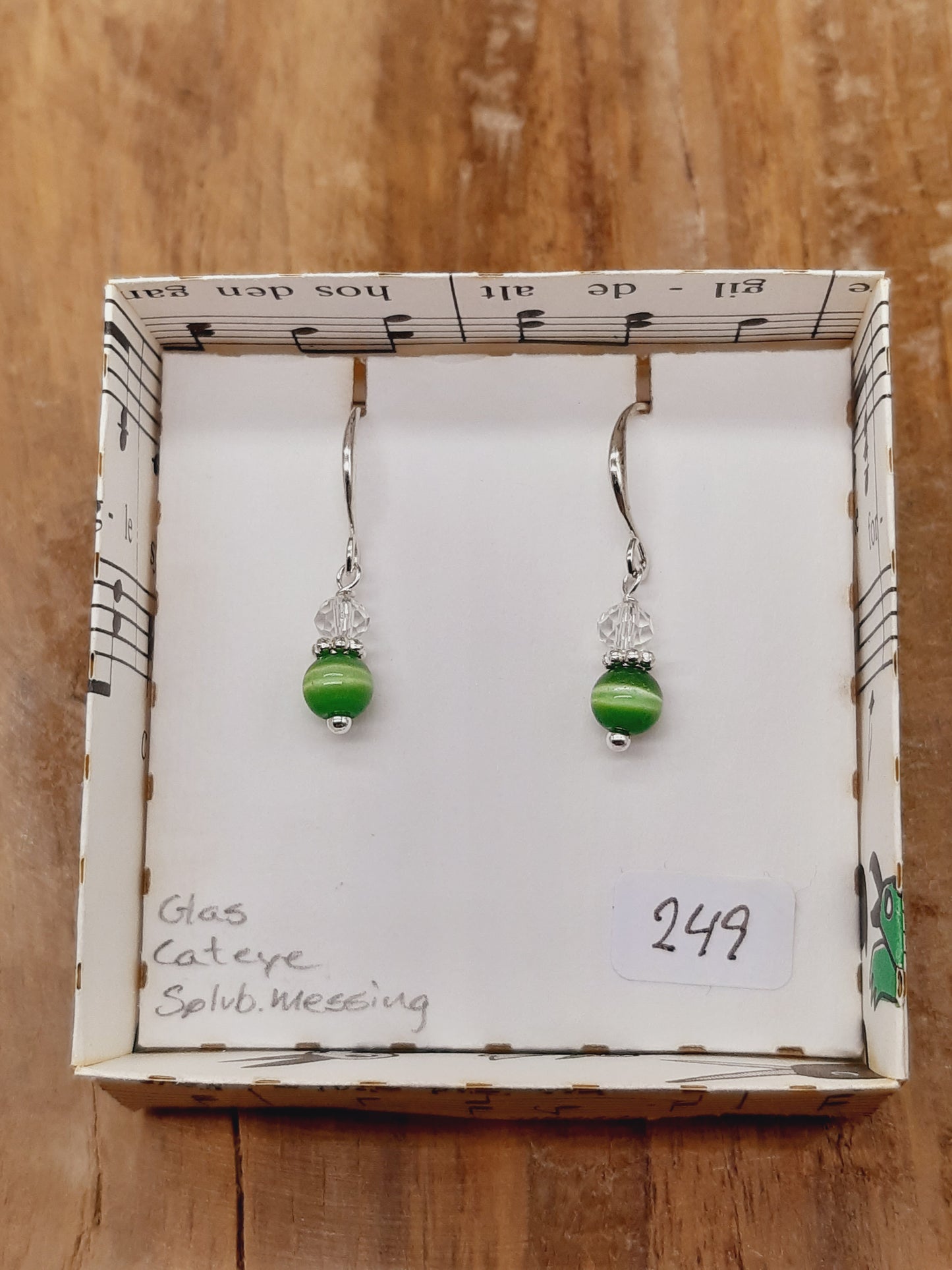 Grøn cateye og klar facetglas